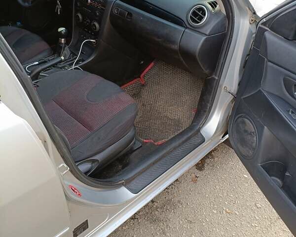 Серый Мазда 3, объемом двигателя 1.6 л и пробегом 383 тыс. км за 3400 $, фото 8 на Automoto.ua