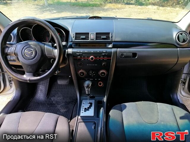 Серый Мазда 3, объемом двигателя 1.6 л и пробегом 188 тыс. км за 4980 $, фото 3 на Automoto.ua