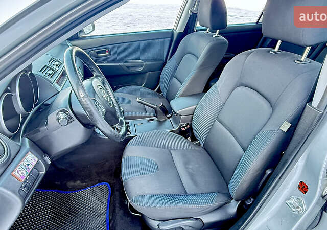 Сірий Мазда 3, об'ємом двигуна 2 л та пробігом 235 тис. км за 4300 $, фото 27 на Automoto.ua