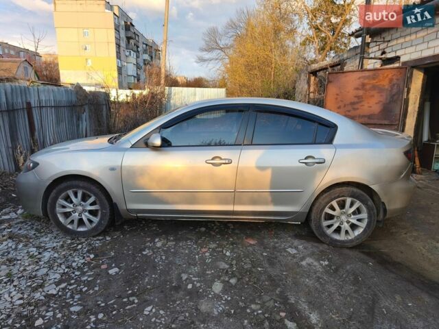 Сірий Мазда 3, об'ємом двигуна 1.6 л та пробігом 297 тис. км за 4600 $, фото 3 на Automoto.ua