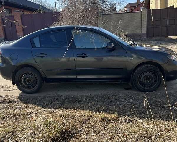 Серый Мазда 3, объемом двигателя 1.6 л и пробегом 300 тыс. км за 5300 $, фото 1 на Automoto.ua