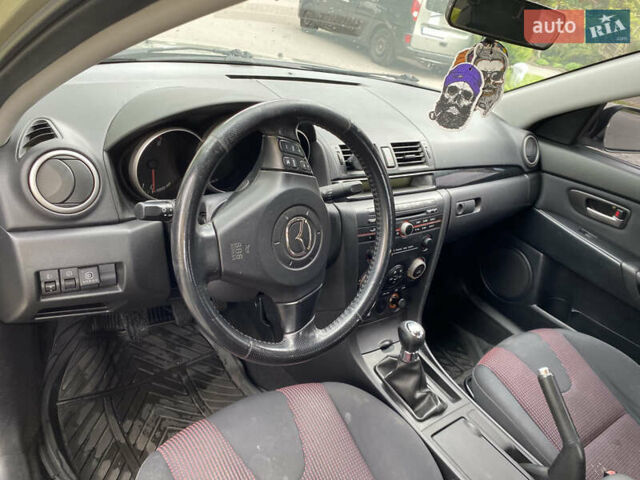 Серый Мазда 3, объемом двигателя 1.6 л и пробегом 260 тыс. км за 5100 $, фото 7 на Automoto.ua
