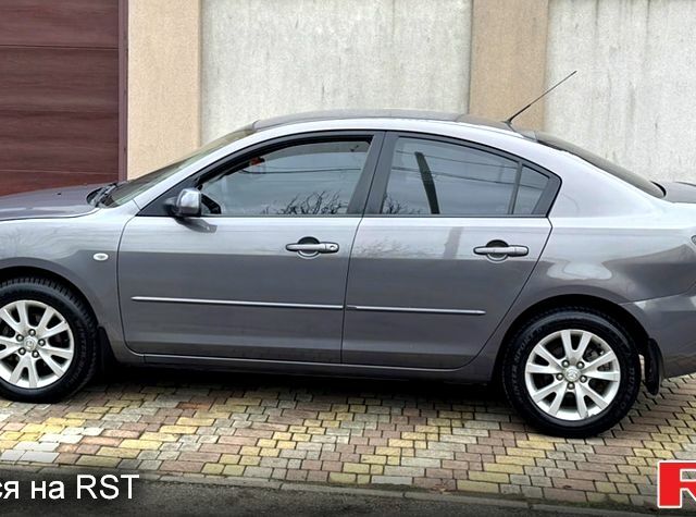 Сірий Мазда 3, об'ємом двигуна 1.6 л та пробігом 195 тис. км за 5500 $, фото 9 на Automoto.ua