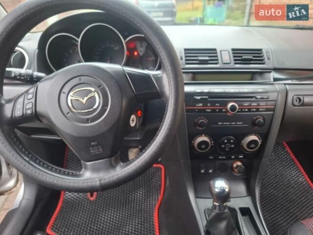 Сірий Мазда 3, об'ємом двигуна 2 л та пробігом 182 тис. км за 4000 $, фото 12 на Automoto.ua