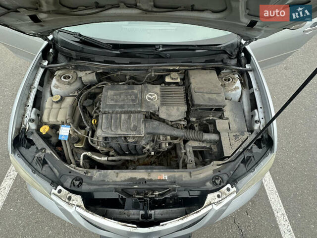 Серый Мазда 3, объемом двигателя 1.6 л и пробегом 127 тыс. км за 4900 $, фото 16 на Automoto.ua