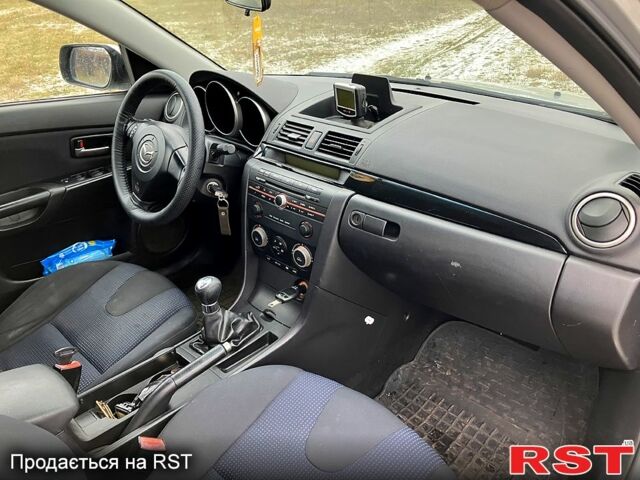 Серый Мазда 3, объемом двигателя 1.6 л и пробегом 213 тыс. км за 4600 $, фото 8 на Automoto.ua