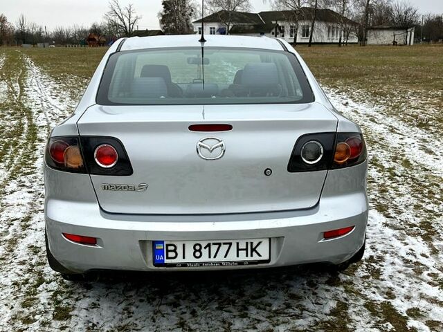 Серый Мазда 3, объемом двигателя 1.6 л и пробегом 213 тыс. км за 4600 $, фото 3 на Automoto.ua