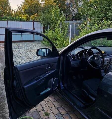 Серый Мазда 3, объемом двигателя 1.6 л и пробегом 269 тыс. км за 4800 $, фото 5 на Automoto.ua