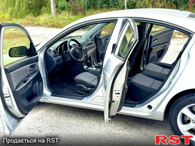 Сірий Мазда 3, об'ємом двигуна 2 л та пробігом 214 тис. км за 4450 $, фото 8 на Automoto.ua