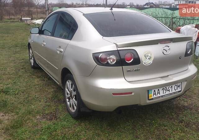 Серый Мазда 3, объемом двигателя 1.6 л и пробегом 241 тыс. км за 3300 $, фото 4 на Automoto.ua