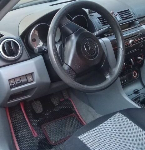 Серый Мазда 3, объемом двигателя 1.6 л и пробегом 288 тыс. км за 5000 $, фото 1 на Automoto.ua