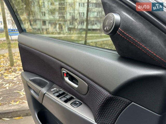 Сірий Мазда 3, об'ємом двигуна 2 л та пробігом 189 тис. км за 4750 $, фото 27 на Automoto.ua