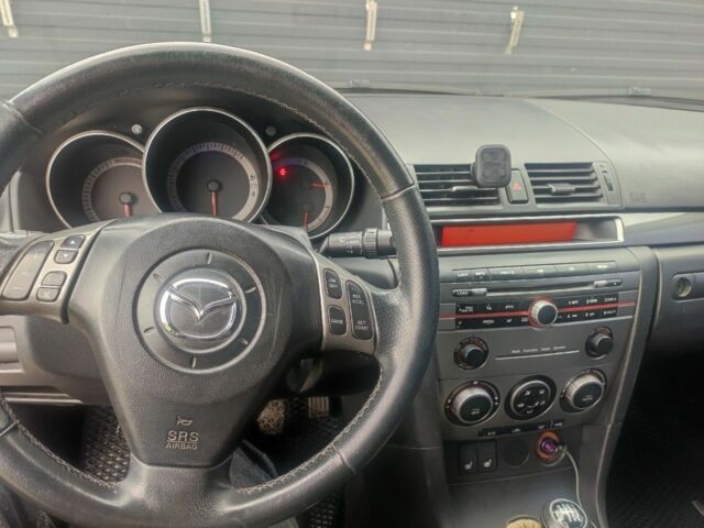 Сірий Мазда 3, об'ємом двигуна 2 л та пробігом 317 тис. км за 3100 $, фото 6 на Automoto.ua