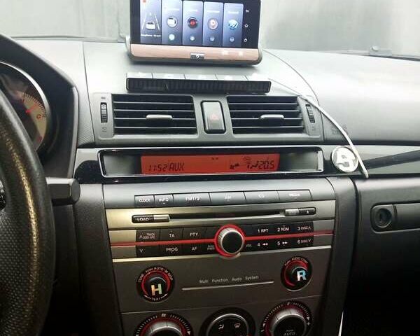 Серый Мазда 3, объемом двигателя 1.6 л и пробегом 175 тыс. км за 5500 $, фото 5 на Automoto.ua