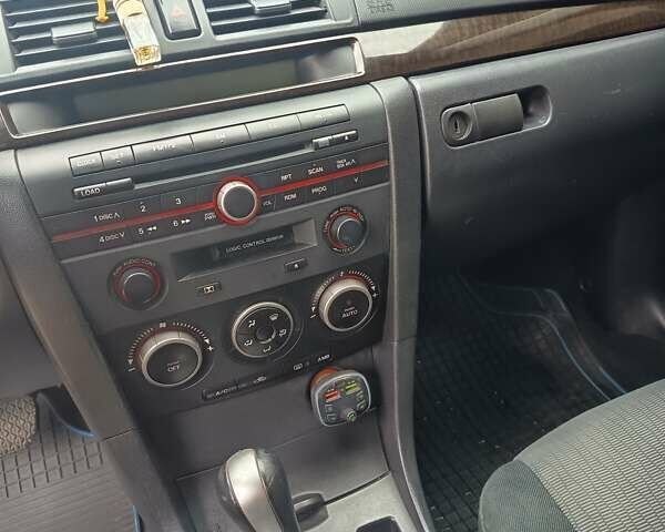 Серый Мазда 3, объемом двигателя 1.6 л и пробегом 196 тыс. км за 6000 $, фото 11 на Automoto.ua