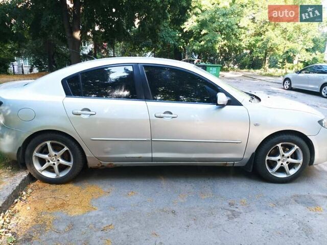 Серый Мазда 3, объемом двигателя 1.6 л и пробегом 225 тыс. км за 3000 $, фото 2 на Automoto.ua