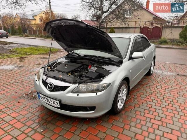 Сірий Мазда 3, об'ємом двигуна 2 л та пробігом 171 тис. км за 5600 $, фото 14 на Automoto.ua