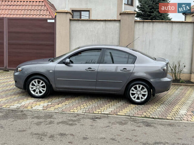 Серый Мазда 3, объемом двигателя 1.6 л и пробегом 178 тыс. км за 5800 $, фото 24 на Automoto.ua