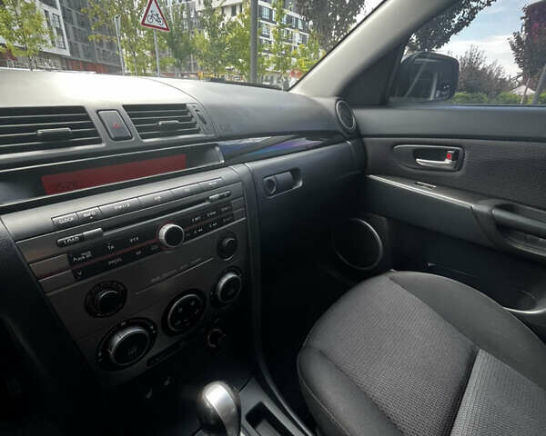Серый Мазда 3, объемом двигателя 1.6 л и пробегом 115 тыс. км за 5700 $, фото 12 на Automoto.ua