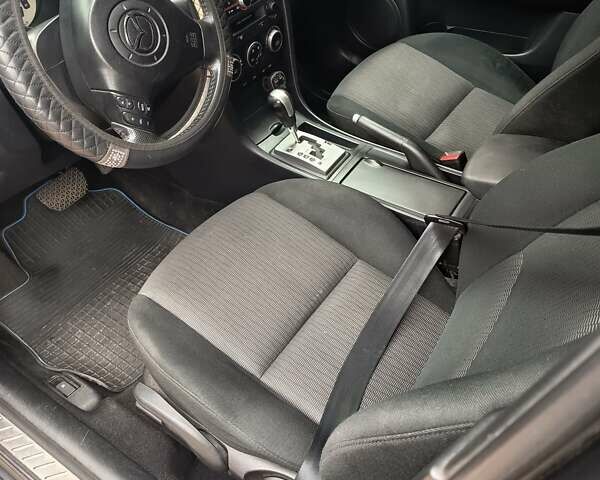 Серый Мазда 3, объемом двигателя 1.6 л и пробегом 196 тыс. км за 6000 $, фото 7 на Automoto.ua