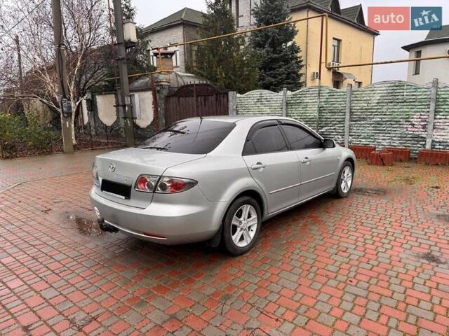 Сірий Мазда 3, об'ємом двигуна 2 л та пробігом 171 тис. км за 5600 $, фото 7 на Automoto.ua