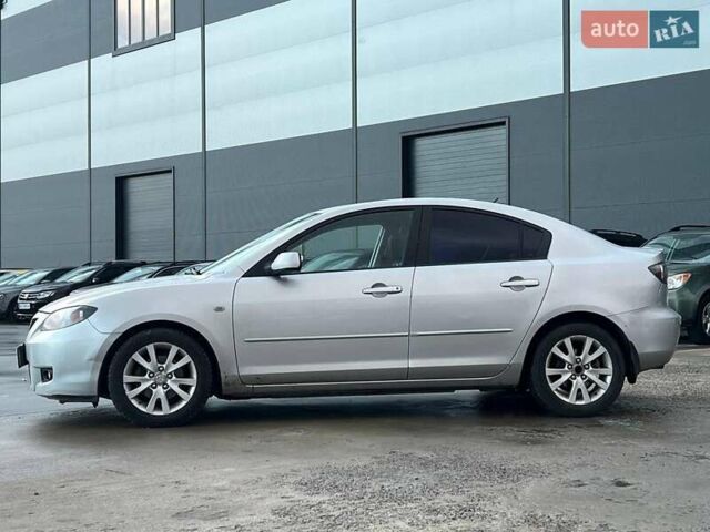 Серый Мазда 3, объемом двигателя 1.6 л и пробегом 305 тыс. км за 5940 $, фото 4 на Automoto.ua