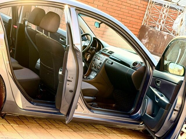 Серый Мазда 3, объемом двигателя 1.6 л и пробегом 172 тыс. км за 5350 $, фото 6 на Automoto.ua