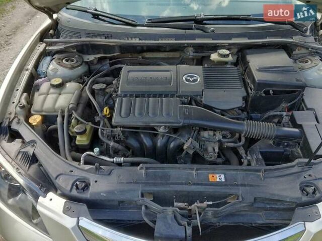 Серый Мазда 3, объемом двигателя 1.6 л и пробегом 186 тыс. км за 5000 $, фото 5 на Automoto.ua