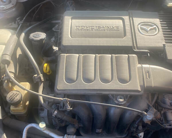 Сірий Мазда 3, об'ємом двигуна 1.6 л та пробігом 185 тис. км за 6000 $, фото 7 на Automoto.ua