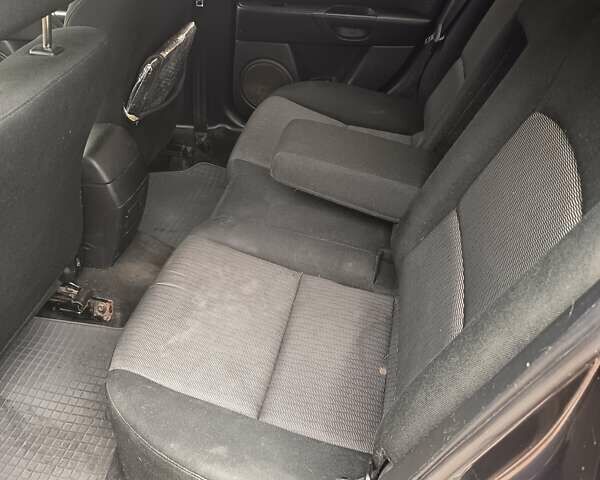 Серый Мазда 3, объемом двигателя 1.6 л и пробегом 196 тыс. км за 6000 $, фото 6 на Automoto.ua