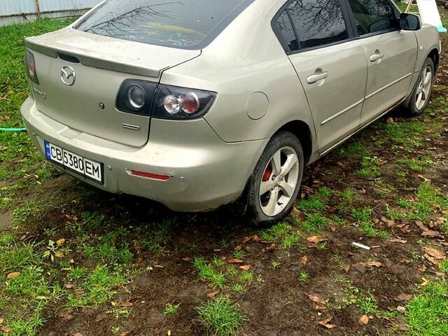 Серый Мазда 3, объемом двигателя 2 л и пробегом 307 тыс. км за 5250 $, фото 2 на Automoto.ua