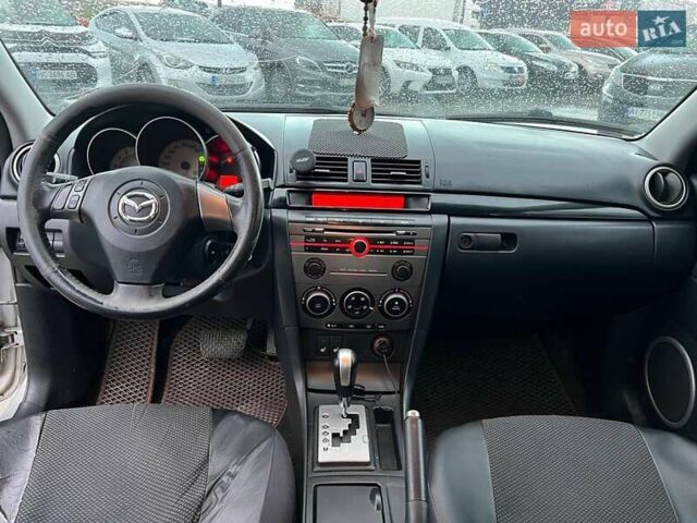 Серый Мазда 3, объемом двигателя 1.6 л и пробегом 305 тыс. км за 5940 $, фото 32 на Automoto.ua