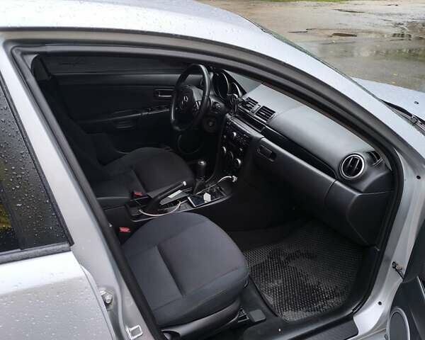 Сірий Мазда 3, об'ємом двигуна 2 л та пробігом 350 тис. км за 4900 $, фото 7 на Automoto.ua
