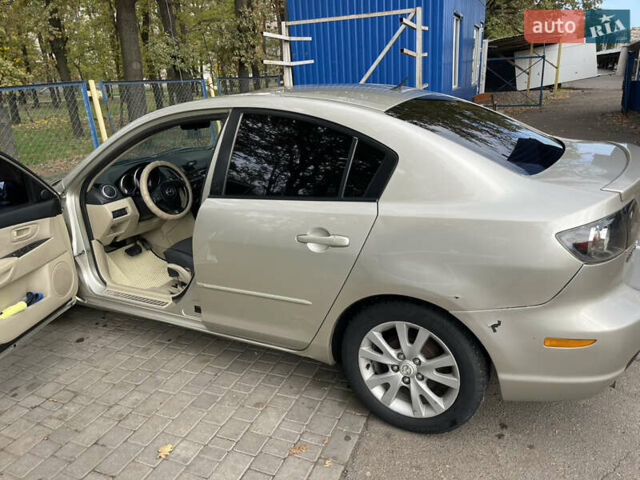 Серый Мазда 3, объемом двигателя 1.6 л и пробегом 170 тыс. км за 5200 $, фото 2 на Automoto.ua