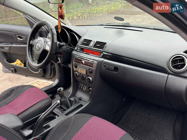 Серый Мазда 3, объемом двигателя 1.6 л и пробегом 178 тыс. км за 5800 $, фото 31 на Automoto.ua