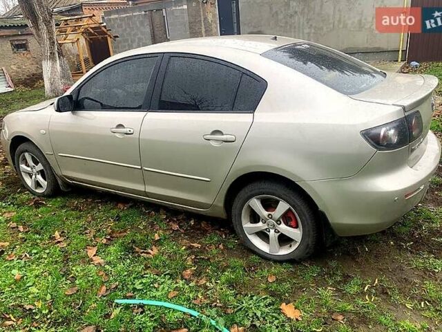 Серый Мазда 3, объемом двигателя 2 л и пробегом 307 тыс. км за 5250 $, фото 2 на Automoto.ua