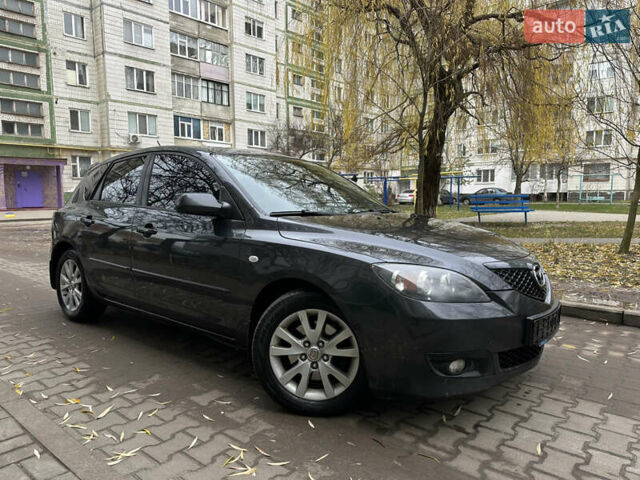 Сірий Мазда 3, об'ємом двигуна 2 л та пробігом 189 тис. км за 4750 $, фото 3 на Automoto.ua