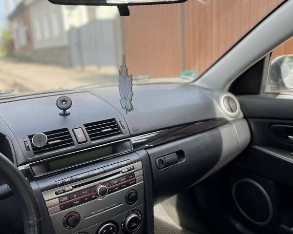 Серый Мазда 3, объемом двигателя 1.6 л и пробегом 149 тыс. км за 5200 $, фото 19 на Automoto.ua
