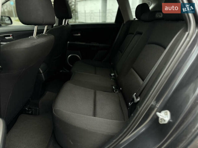 Сірий Мазда 3, об'ємом двигуна 2 л та пробігом 189 тис. км за 4750 $, фото 23 на Automoto.ua