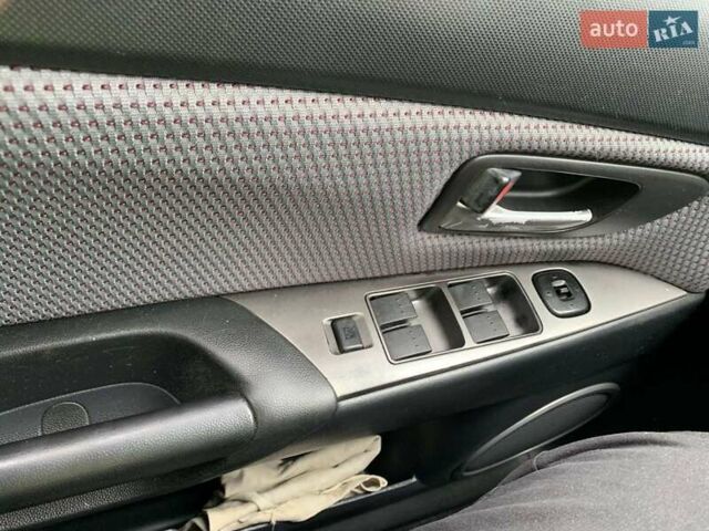 Серый Мазда 3, объемом двигателя 1.6 л и пробегом 285 тыс. км за 5700 $, фото 7 на Automoto.ua