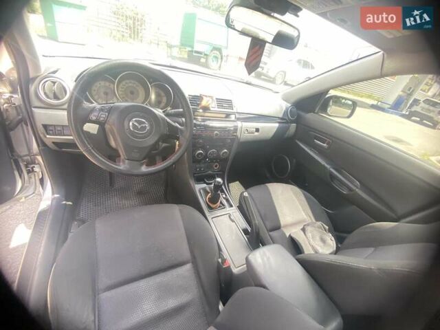 Серый Мазда 3, объемом двигателя 1.6 л и пробегом 240 тыс. км за 4850 $, фото 8 на Automoto.ua