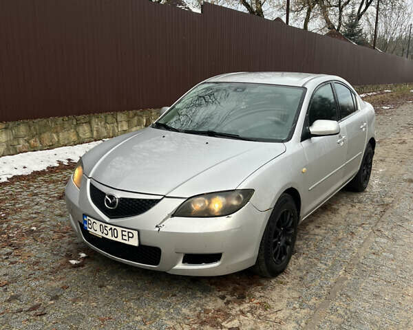Серый Мазда 3, объемом двигателя 1.6 л и пробегом 212 тыс. км за 2700 $, фото 1 на Automoto.ua