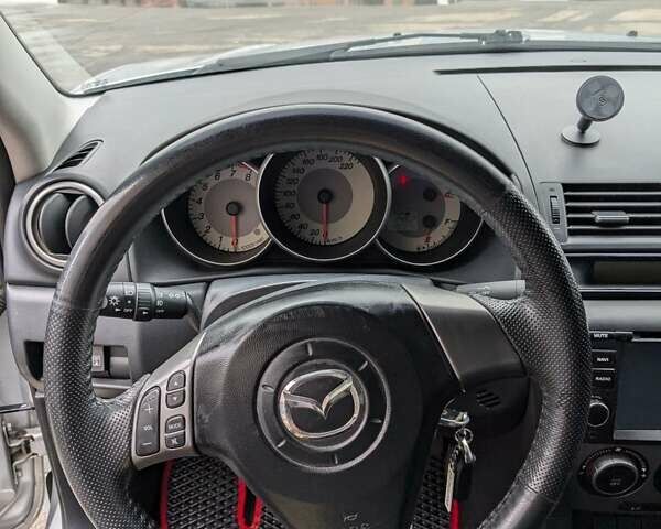 Сірий Мазда 3, об'ємом двигуна 1.6 л та пробігом 200 тис. км за 4900 $, фото 13 на Automoto.ua