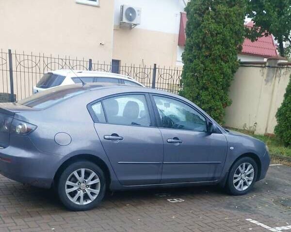 Серый Мазда 3, объемом двигателя 1.6 л и пробегом 250 тыс. км за 5400 $, фото 1 на Automoto.ua