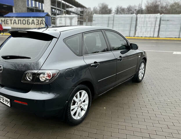 Серый Мазда 3, объемом двигателя 2 л и пробегом 188 тыс. км за 4999 $, фото 12 на Automoto.ua