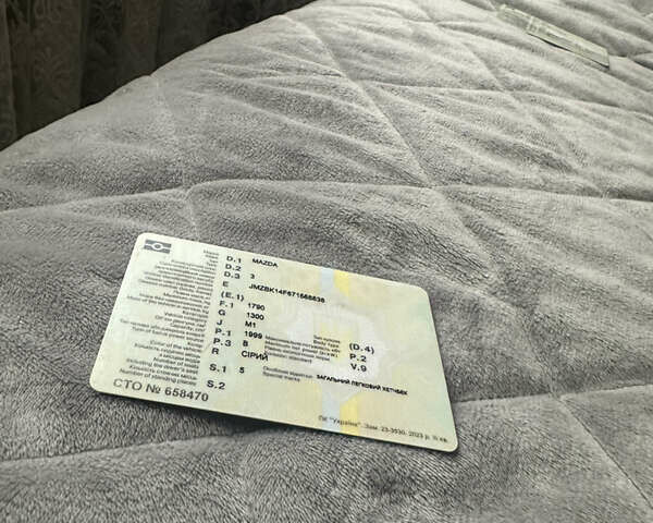 Сірий Мазда 3, об'ємом двигуна 2 л та пробігом 189 тис. км за 4750 $, фото 31 на Automoto.ua