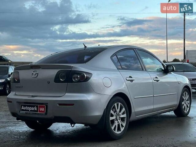 Серый Мазда 3, объемом двигателя 1.6 л и пробегом 305 тыс. км за 5940 $, фото 7 на Automoto.ua