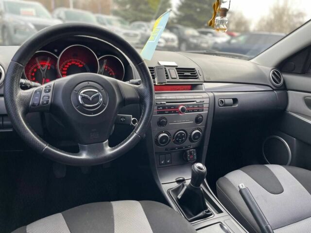 Серый Мазда 3, объемом двигателя 2 л и пробегом 184 тыс. км за 5400 $, фото 16 на Automoto.ua