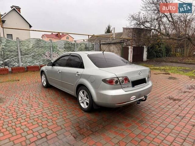 Сірий Мазда 3, об'ємом двигуна 2 л та пробігом 171 тис. км за 5600 $, фото 2 на Automoto.ua