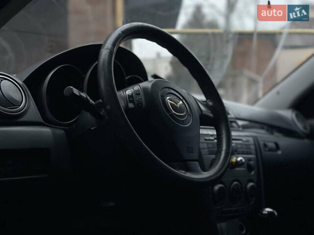 Сірий Мазда 3, об'ємом двигуна 1.6 л та пробігом 227 тис. км за 3500 $, фото 12 на Automoto.ua